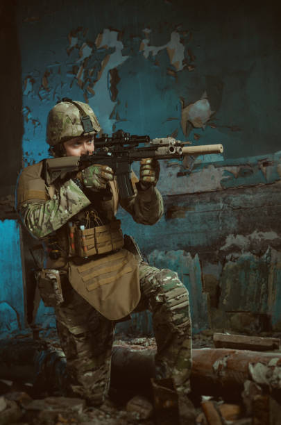 istock the people in uniform with weapons in the ruins 1040795190