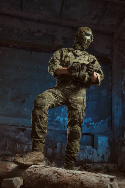 istock the people in uniform with weapons in the ruins 1040795206
