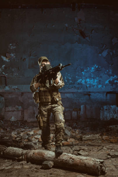 istock the people in uniform with weapons in the ruins 1040795212
