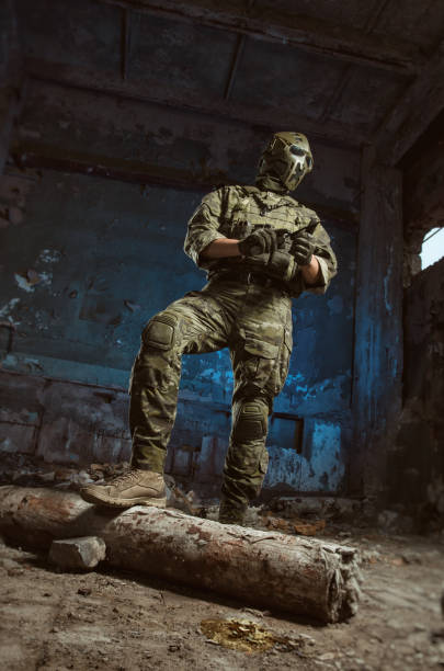 istock the people in uniform with weapons in the ruins 1040795218