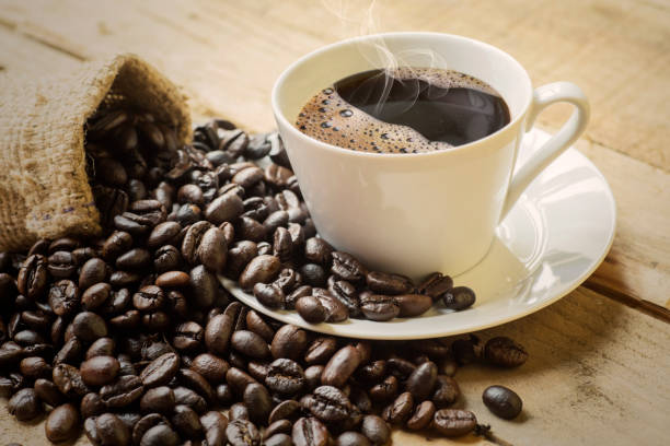istock Cup of hot coffee with burlap bag 1040814134