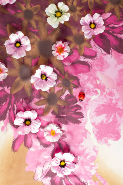 istock Pink fabric inlaid flowers. texture 1040820762