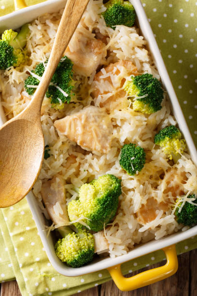 istock Rice baked with broccoli, chicken and cheese macro. Vertical top view 1040834766