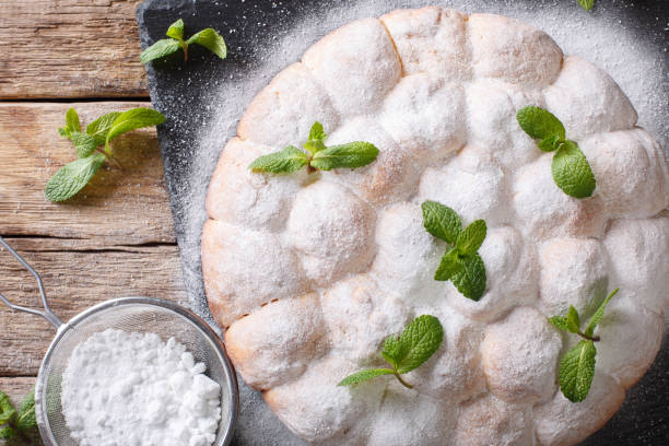 istock sweet Austrian rolls buchteln with powdered sugar close-up. horizontal top view 1040841738