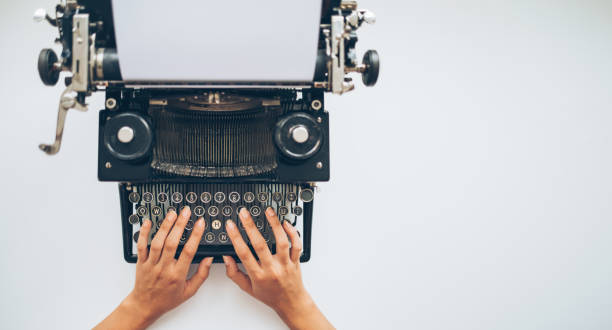 let's type a story - writing typewriter 1950s style retro revival imagens e fotografias de stock