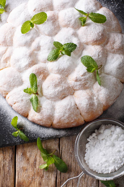 istock Austrian buchteln - sweet yeast rolls, delicious buns close-up. Vertical top view 1040842768