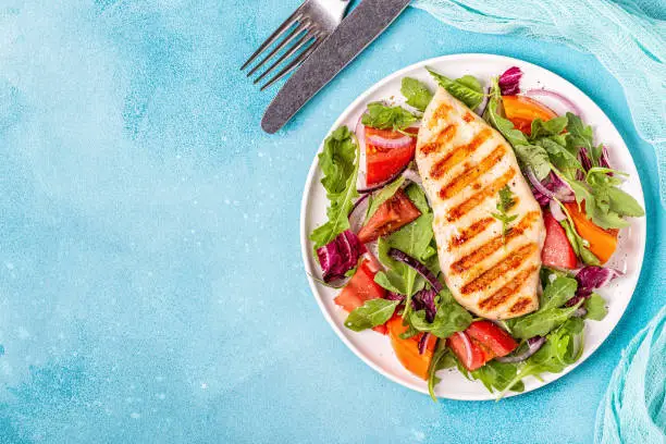 Photo of Chicken breast with fresh salad