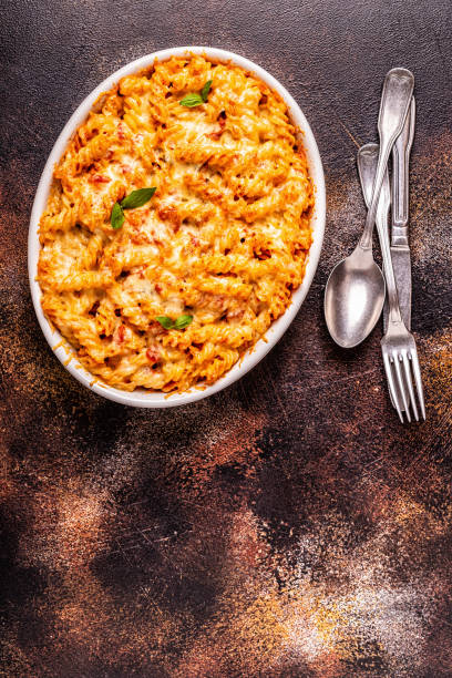 istock Mac and cheese, pasta baked with cheese sauce 1040849620
