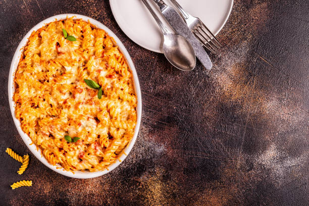 istock Mac and cheese, pasta baked with cheese sauce 1040849722