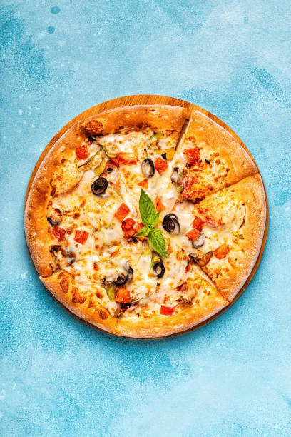 istock Vegetarian pizza with mushrooms, vegetables, cheese 1040850220