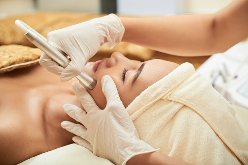 Process of professional facial lymphatic drainage massage