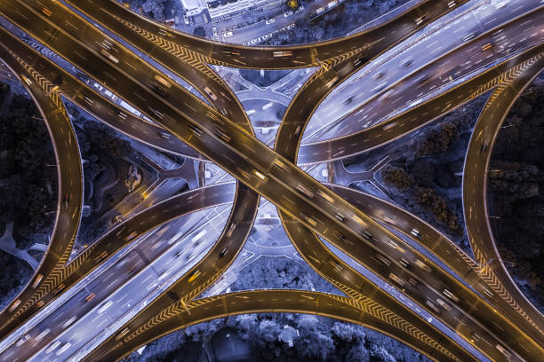 istock aerial view of highway interchange at night 1040853210