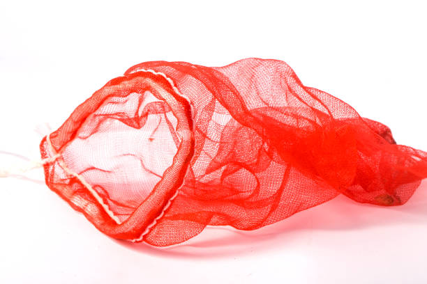 istock Vegetable red net bag isolated on white background 1040856002