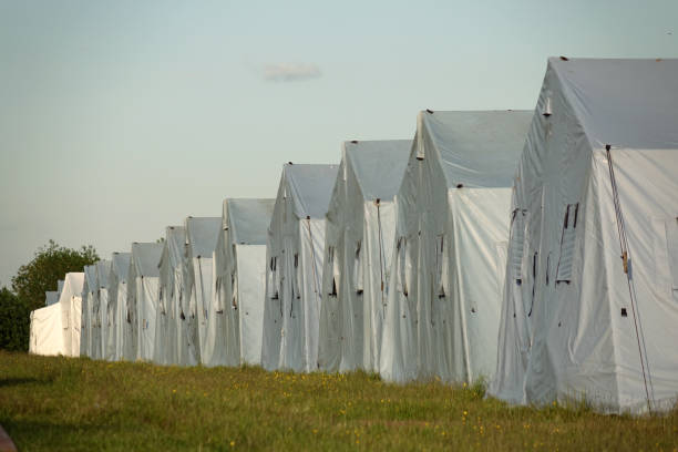 istock white large army tents. rescue camp. 1040859612