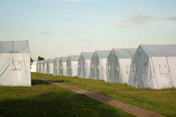 istock white large army tents. rescue camp. 1040859672