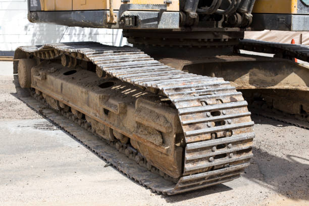 istock Excavator work on the ground on isolated 1040868602
