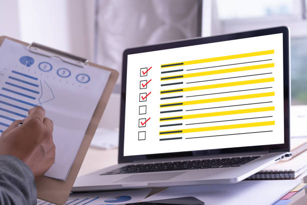istock businessman SURVEY and Results Analysis Discovery Concept 1040871496