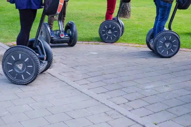 Group of tourist riding segway in the city