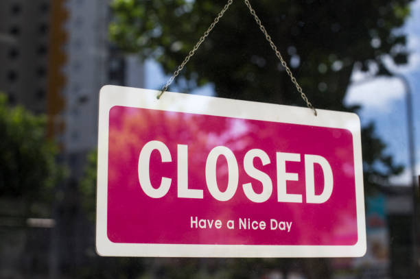 istock Vintage looking Closed sign with reflections. 1040878478