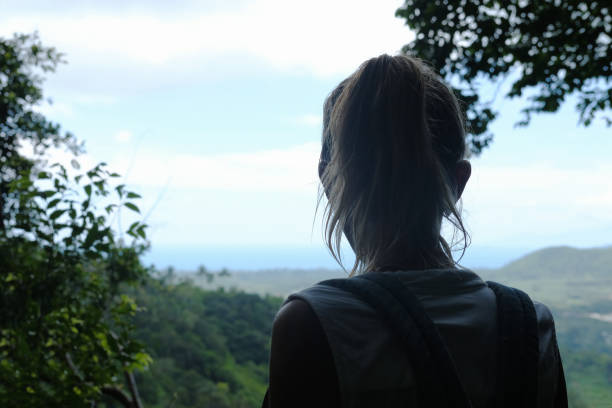 istock Woman looking from top of hill 1040885834