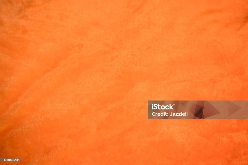 Джерси ярко-оранжевая ткань со светлыми складками крупным планом - Стоковые фото Абстрактный роялти-фри