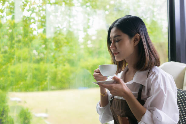 istock Woman in a cafe drinking coffee. happy time 1040891364