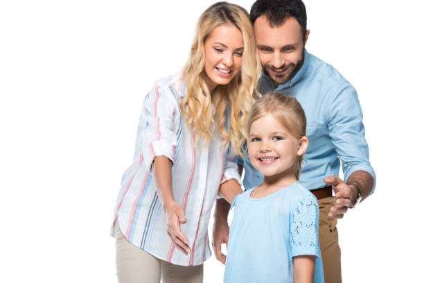 istock happy parents with kid isolated on white 1040896210