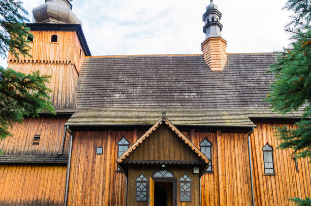 Old wooden church with roof in Krużlowa Wyżna, a village in the administrative district of Gmina Grybów, within Nowy Sącz County, Lesser Poland Voivodeship, in southern Poland.