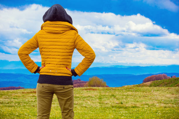 istock Confident woman looking at the distant landscape. 1040901266
