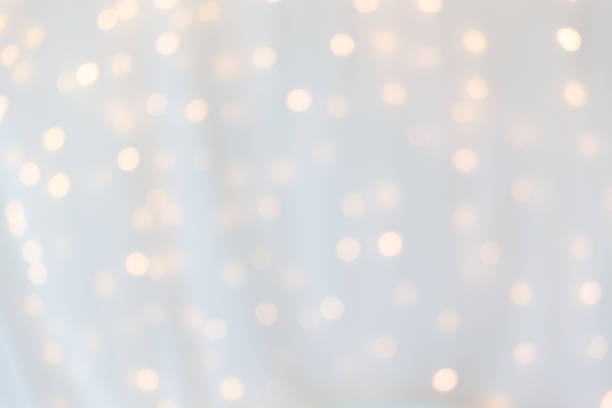 istock bokeh of yellow led light under curtain. 1040902646