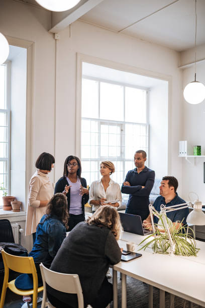 istock Business and coworking with multi-ethnic professionals 1040905402