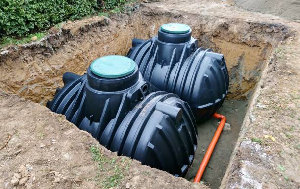 réservoirs de stockage souterrains eau de pluie - réservoir de stockage photos et images de collection
