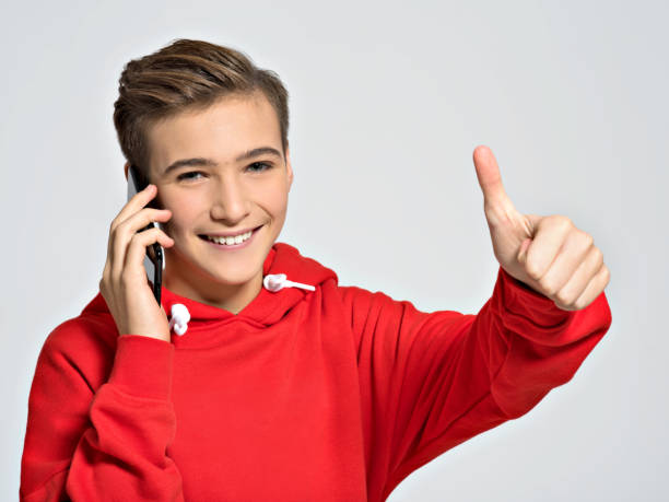 istock Young teenager calling  by mobile phone 1040906796