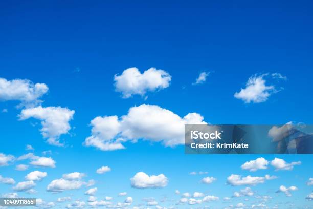 Many Little Fluffy Clouds In Blue Sky In Sunny Day Stock Photo - Download Image Now - Sky, Blue, Cloudscape