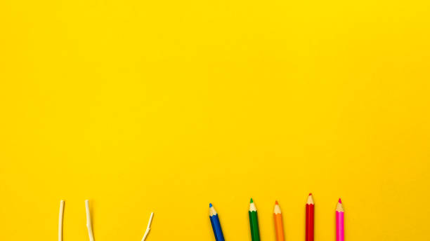 istock Color pencil on yellow background  business concept copyspace 1040912430
