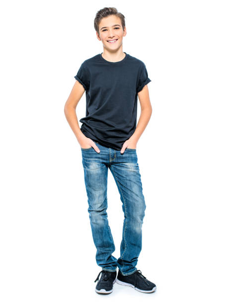 Photo of handsome teenage young guy Photo of handsome teenage young guy - looking at camera. Full portrait of pretty boy. teenager boy haircuts stock pictures, royalty-free photos & images