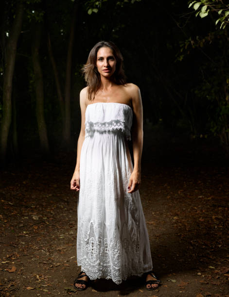 istock Woman walking in a park 1040920896