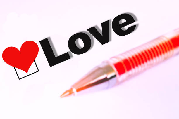istock questionnaire with the inscription love and a red pen 1040931216