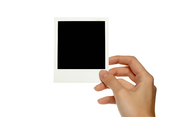 istock instant photo in female hand 104093594