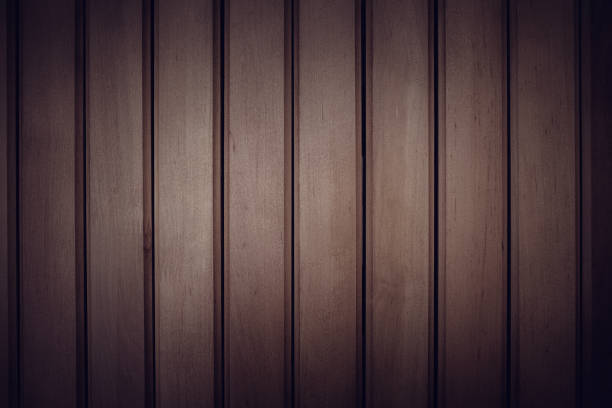 istock Dark brown polished wooden planks texture background 1040941354