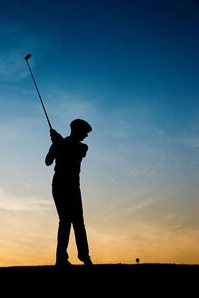 istock Senior female golf player at sunset 104094162