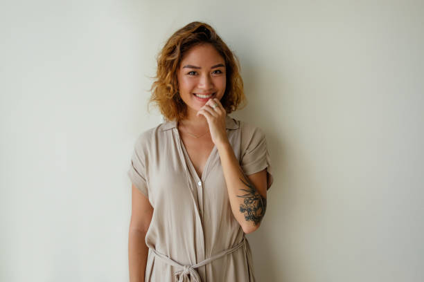 istock Cheerful beautiful girl flirting at camera 1040949796