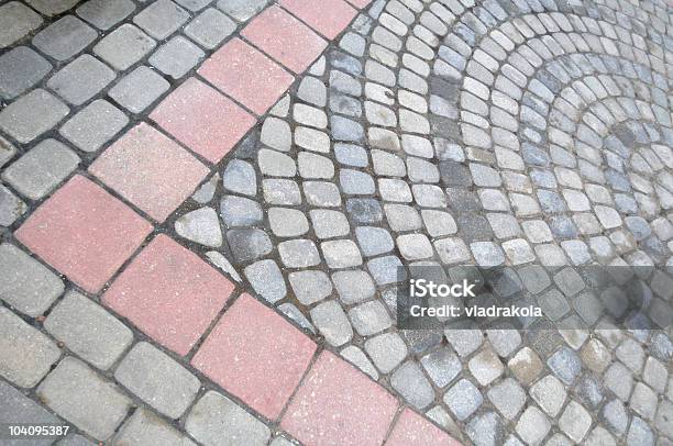 Paving Stones Forming Circles And An Arrow Stock Photo - Download Image Now - Acute Angle, Angle, Backgrounds