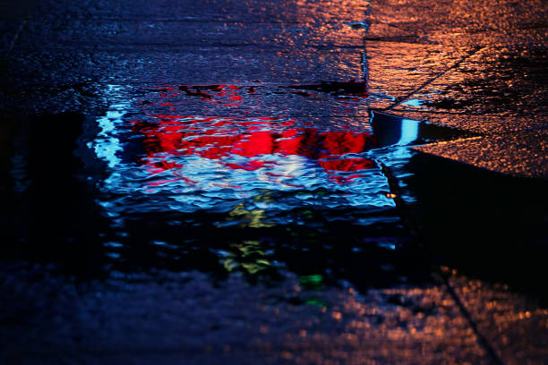 istock reflection in a puddle after rain advertising 1040956614