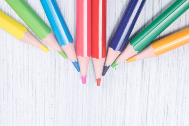 istock multicolored slips of pencils, close-up, on a light background, lie on top 1040960420
