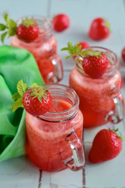 istock Fresh strawberry juice with mint leaf in a jar 1040960910