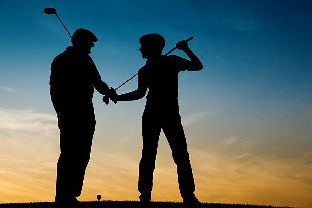 istock Senior couple playing Golf at sunset 104096183