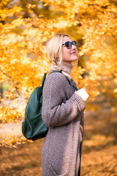 istock Young woman enjoying autumn 1040965896