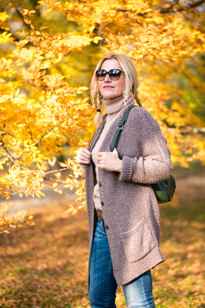 istock Young woman enjoying autumn 1040965906