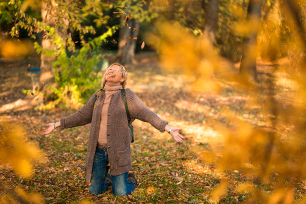 istock Young woman enjoying autumn 1040965986